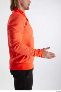 Erling  1 arm dressed flexing orange long sleeve t…